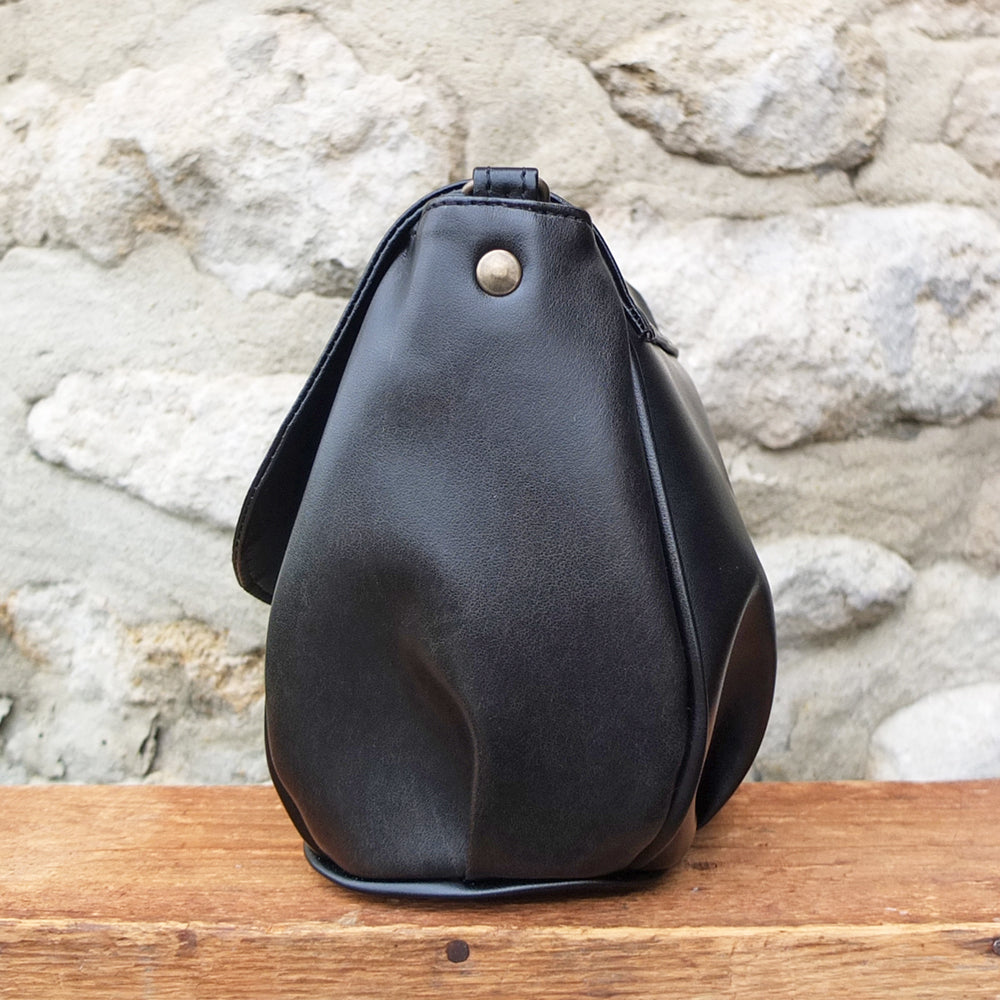 sac en cuir de pomme total noir pour un look classique et intemporel